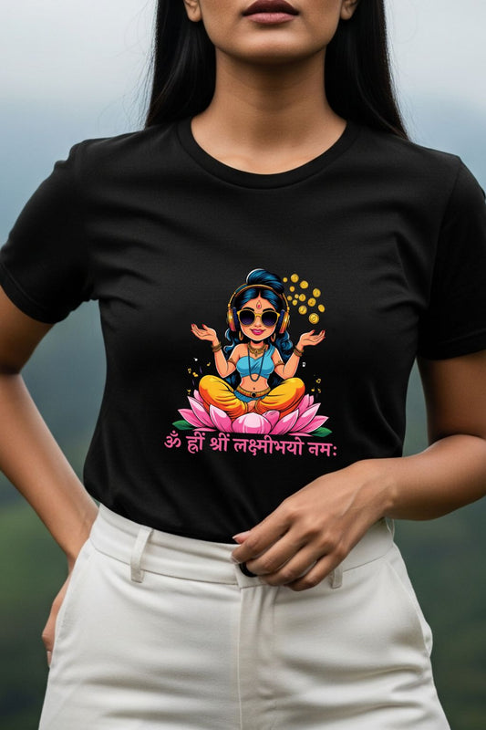 ZUPPI's "DJ Lakshmi Beats & Blessings" black t-shirt, featuring a colorful modern graphic of Maa Lakshmi, shown in a closer look against a blurred background.