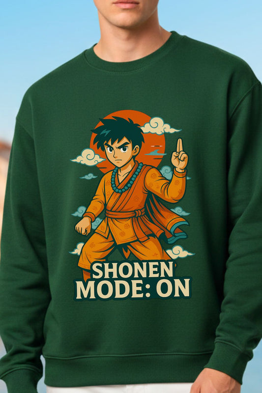 close up of a man wearing a green oversized sweatshirt with an animated character and 'Shonen Mode: On' text on a blue background