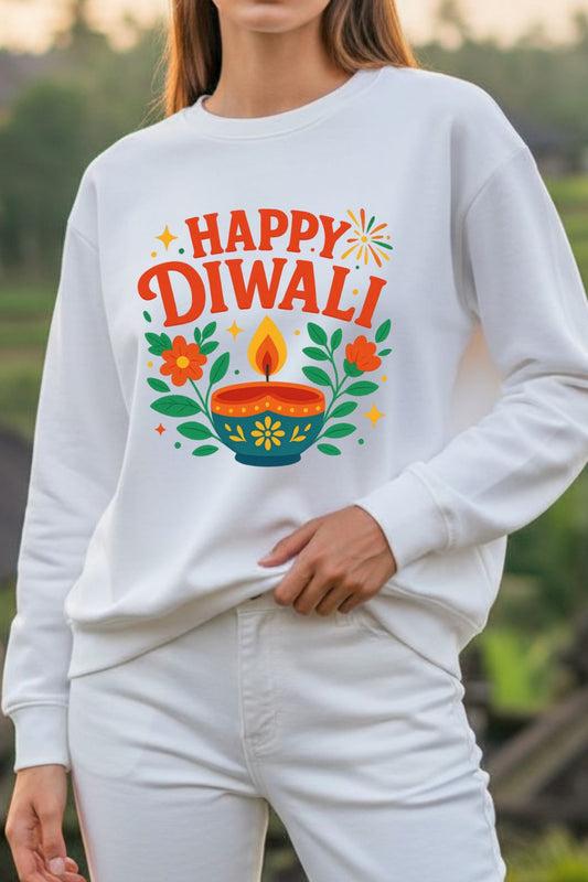 Close up of a woman wearing a white sweatshirt with 'Happy Diwali' design outdoors.