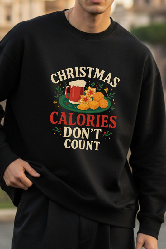Black sweatshirt with Christmas Calories Don't Count design worn by a person.
