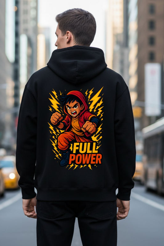 Man wearing a black hoodie with a colorful graphic on the back in an urban setting
