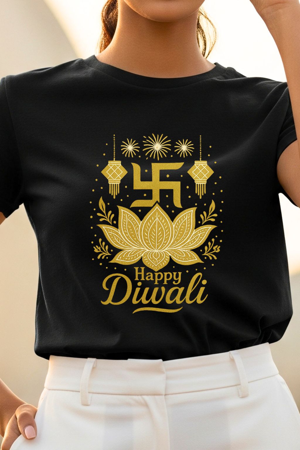 Golden lotus and swastik graphic on a close-up of a black Diwali t-shirt from ZUPPI.