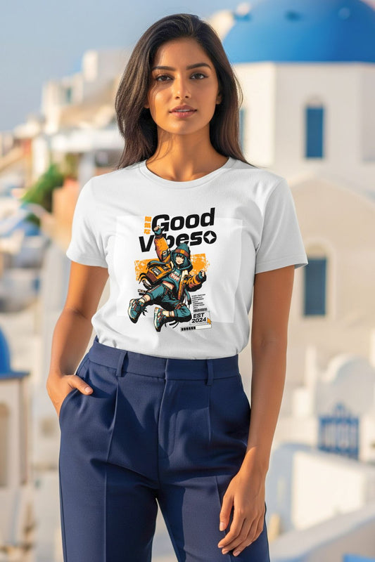 Woman wearing a 'Good Vibes' white t-shirt while on vacation in Santorini. The t-shirt has a trendy, minimalist graphic and is perfect for travel and casual wear.