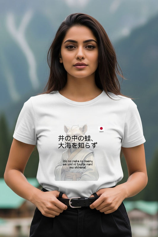 A woman modeling ZUPPI's "A frog in a well knows nothing about the sea" white T-shirt, holding her belt loops while standing outdoors