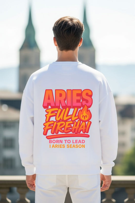 Man wearing a white sweatshirt with 'ARIES FULL FIREHAI' text on the back, standing outdoors.