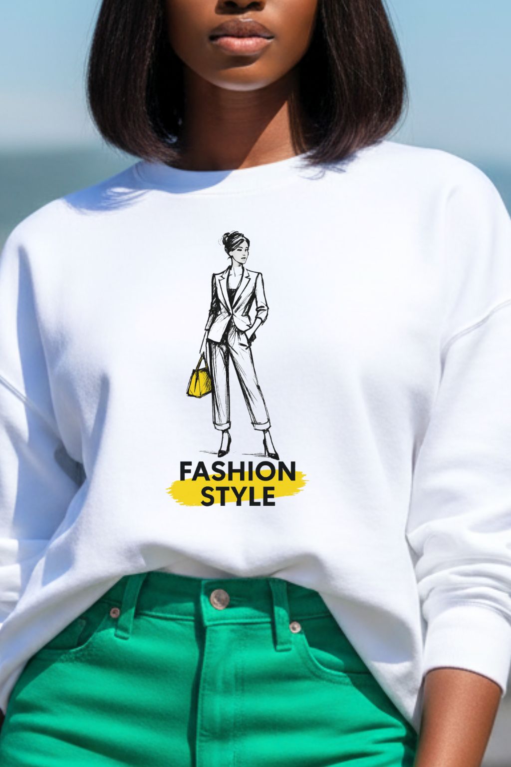 close up of a woman wearing a white oversized sweatshirt with a fashion-themed graphic and text.