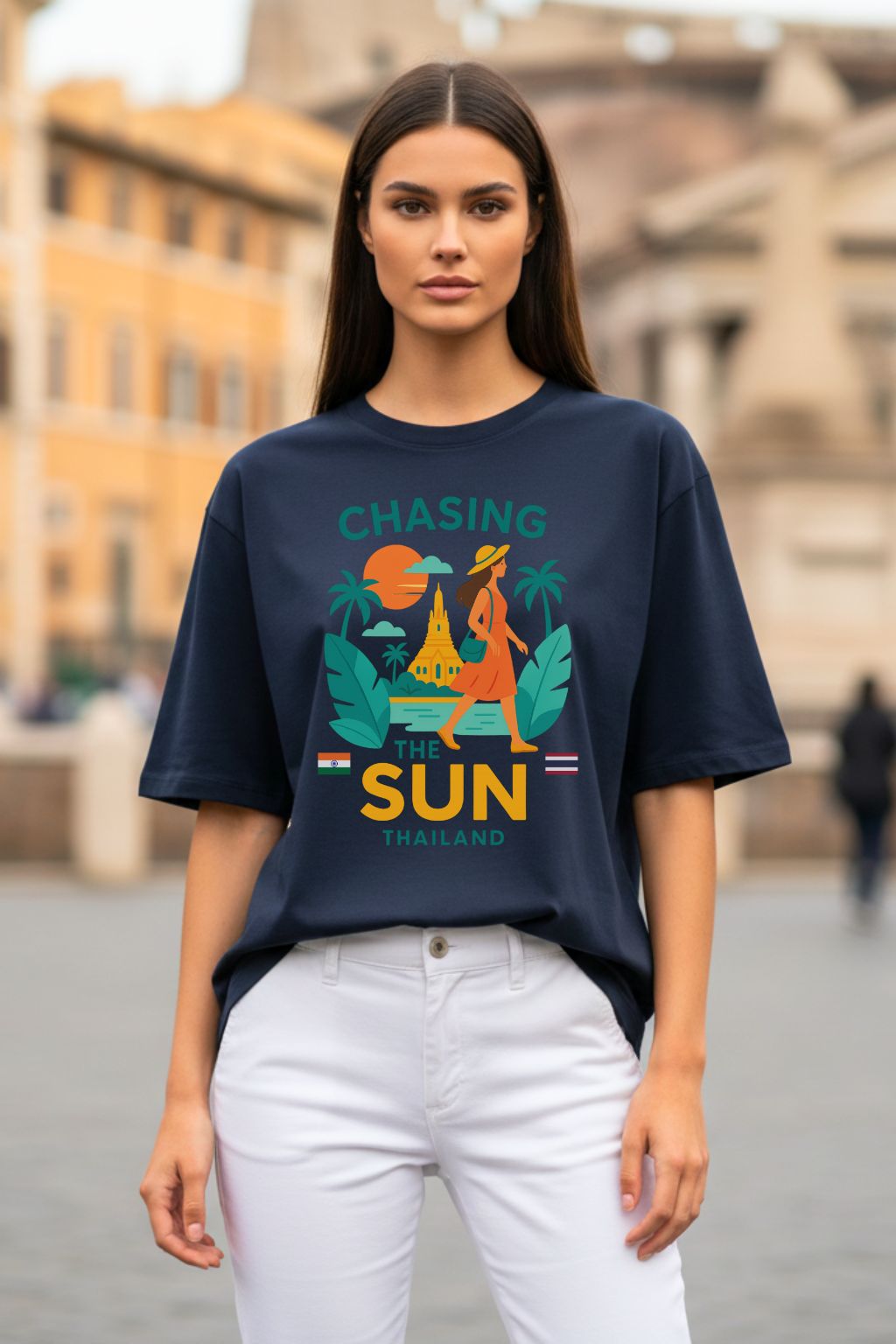Woman wearing a navy blue oversized t-shirt with a colorful graphic design in an urban setting