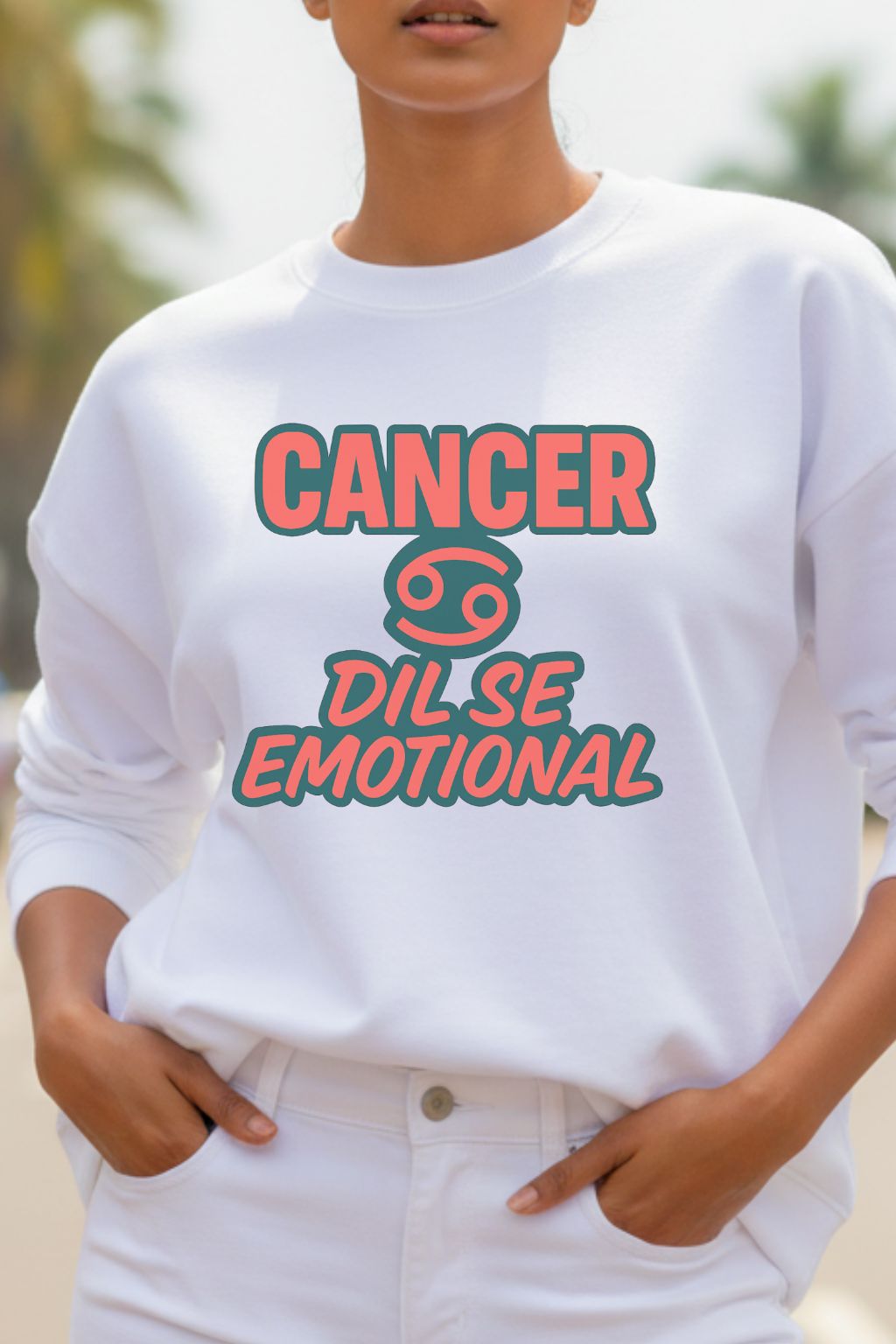 close up of a woman wearing a white oversized sweatshirt with 'Cancer Dil Se Emotional' text and zodiac symbol.
