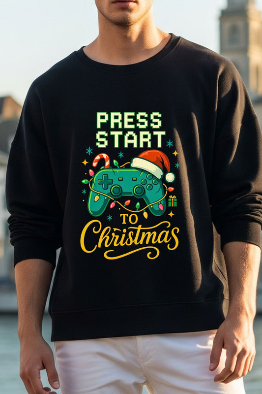 Man wearing a black sweatshirt with a Christmas-themed design featuring text and graphics.