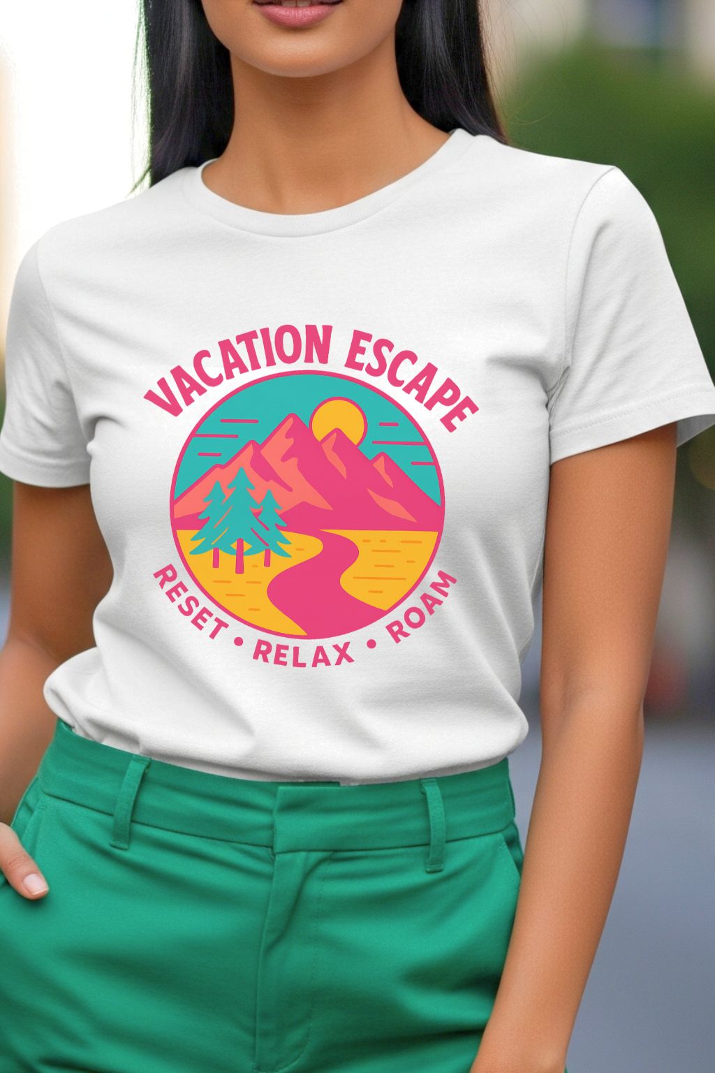Woman wearing a white t-shirt with a colorful graphic and text 'Vacation Escape Reset Relax Roam'.