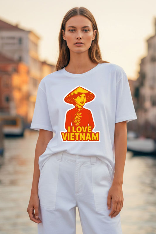 Woman wearing a white t-shirt with an 'I Love Vietnam' graphic design on a city street.