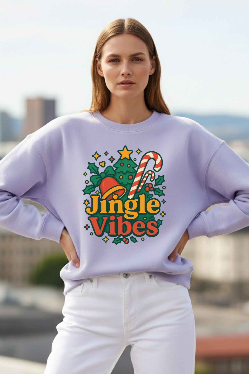 Woman wearing a lavendar oversized sweatshirt with 'Jingle Vibes' design outdoors.