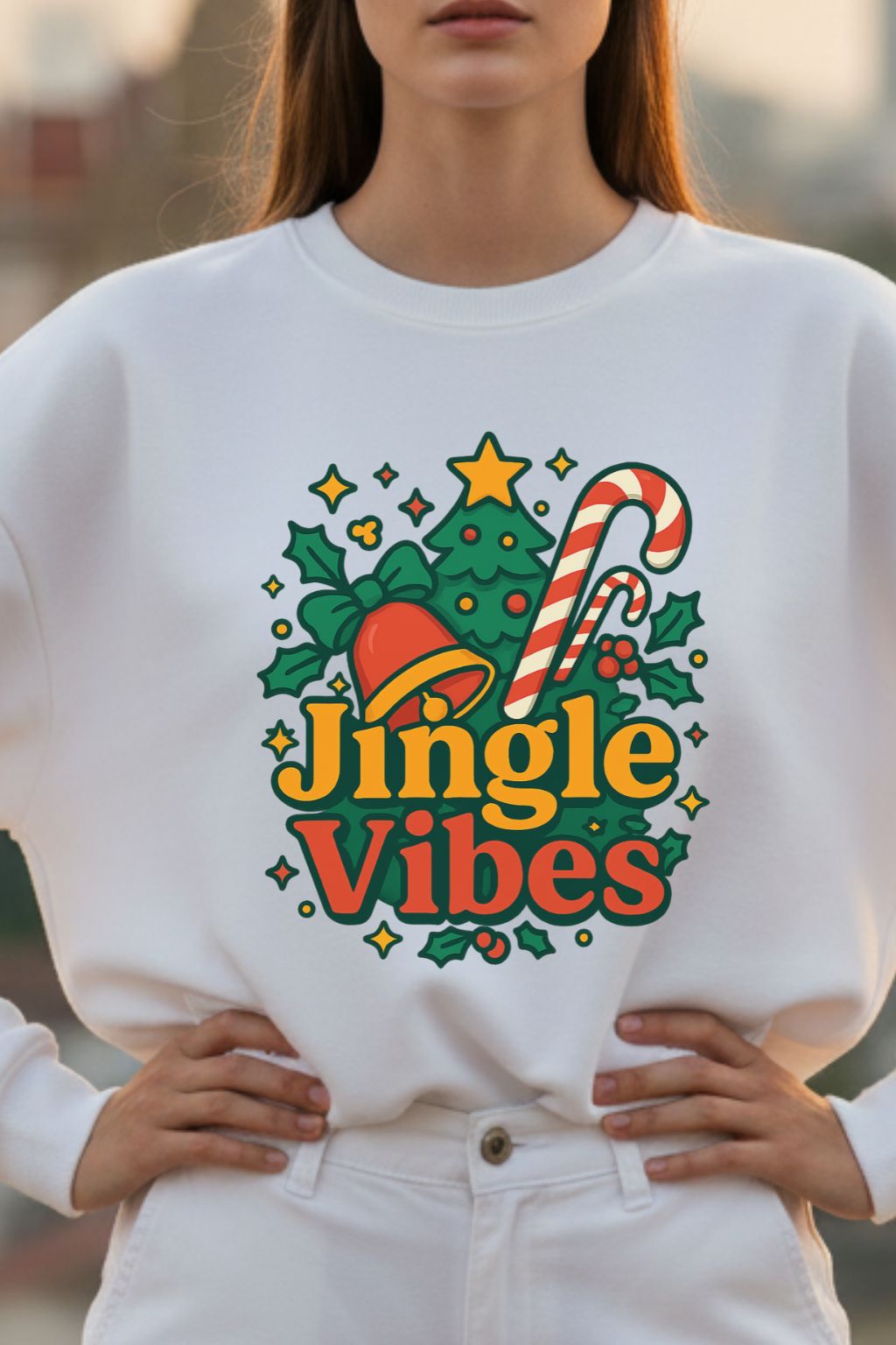 close up of a woman wearing a white oversized sweatshirt with 'Jingle Vibes' design