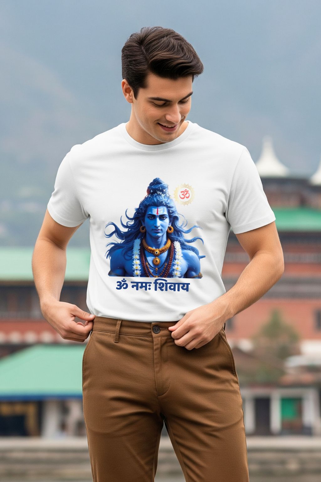 White graphic t-shirt featuring a stylized Lord Shiva and sacred Sanskrit shloka, perfect for spiritual and devotional wear.