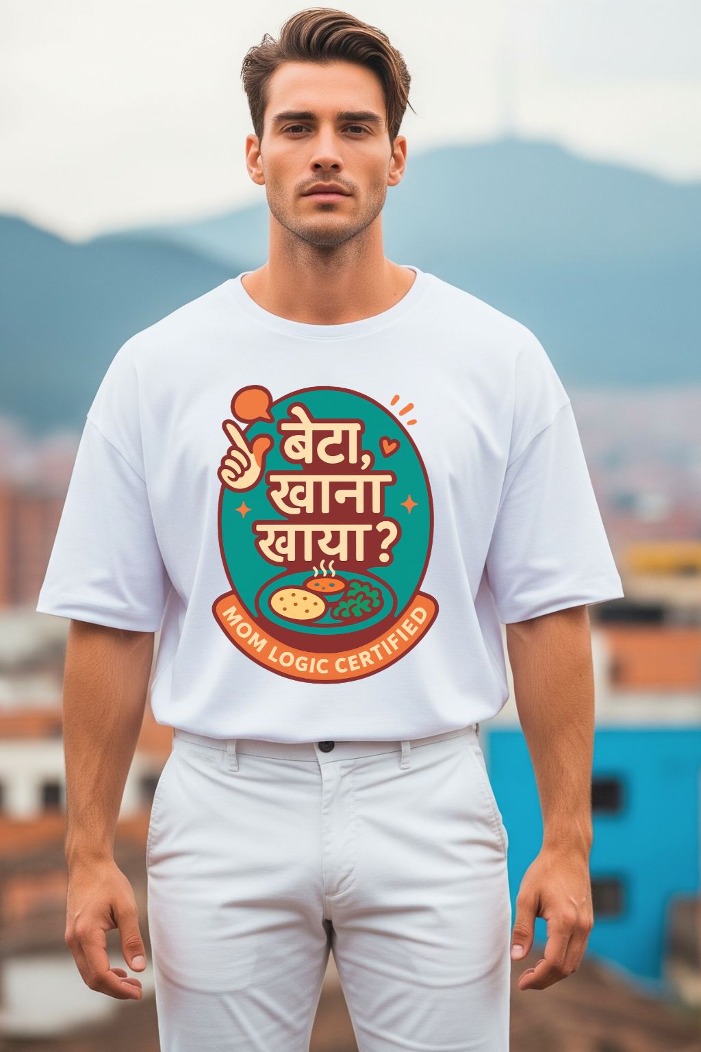 Man wearing a white t-shirt with a colorful graphic design outdoors.