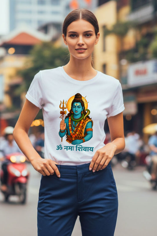 Woman wearing a white t-shirt with a graphic design of Lord Shiva on a city street.