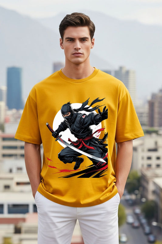 Man wearing a yellow t-shirt with a black ninja graphic in an urban setting