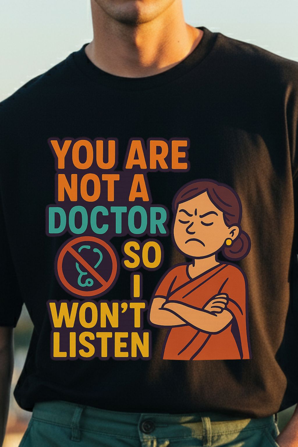 Man wearing a black t-shirt with a graphic and text 'You are not a doctor so I won't listen'.