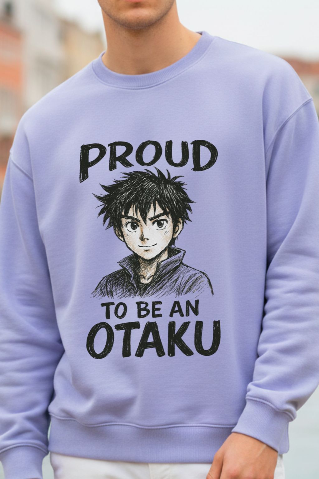 close up of a man wearing a lavendar oversized sweatshirt with an anime character and text 'Proud to be an Otaku'.