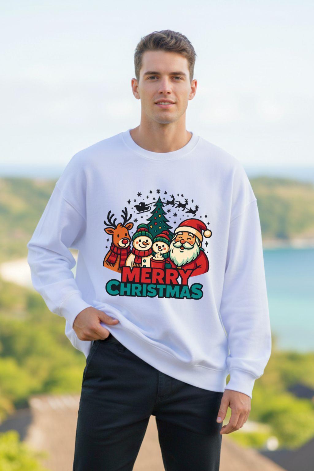 Man wearing a white oversized sweatshirt with a Christmas design featuring Santa Claus, reindeer, and trees, standing outdoors.