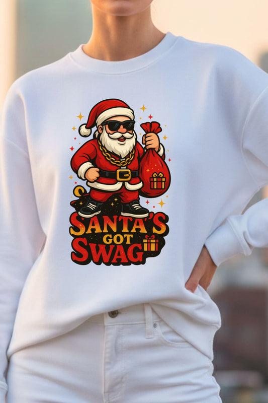 White sweatshirt with a graphic of Santa Claus holding a gift bag and text 'Santa's Got Swag' on a blurred background.