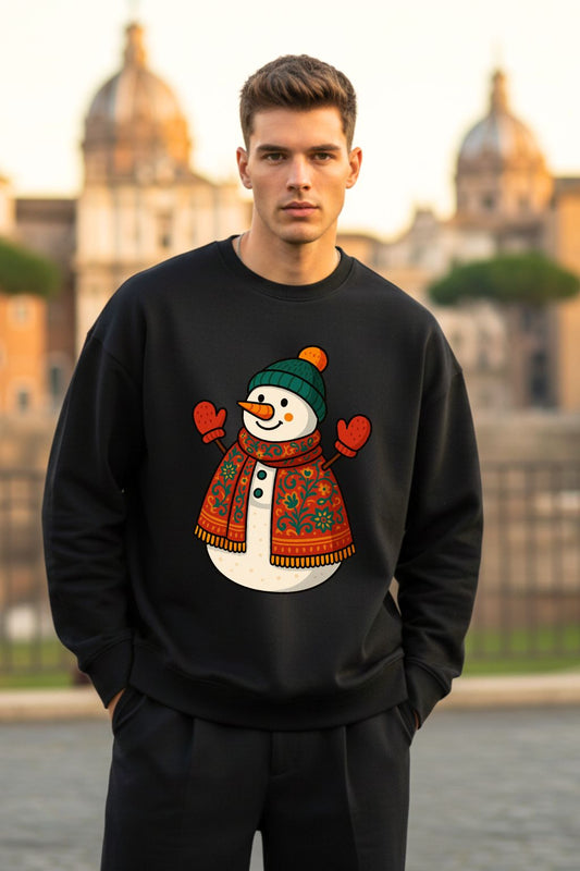 Man wearing a black sweater with a snowman design in an urban setting