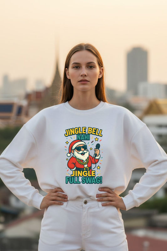 Woman wearing a white sweatshirt with a festive design in an urban setting