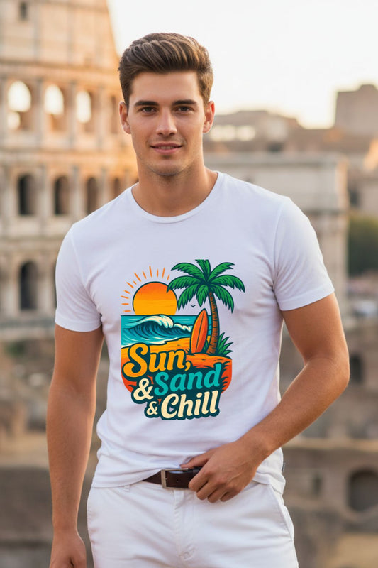Man wearing a white t-shirt with 'Sun, Sand & Chill' design in front of a blurred architectural background