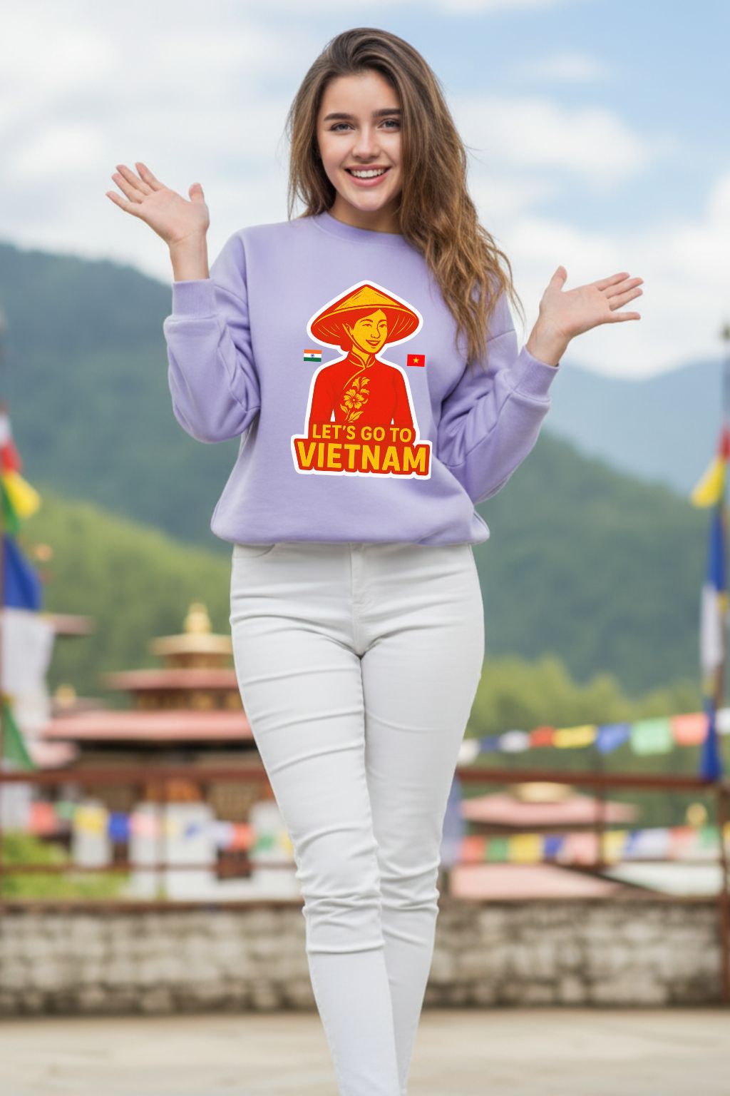 Woman wearing a lavendar oversized sweatshirt with a Vietnam-themed design in a scenic outdoor setting.