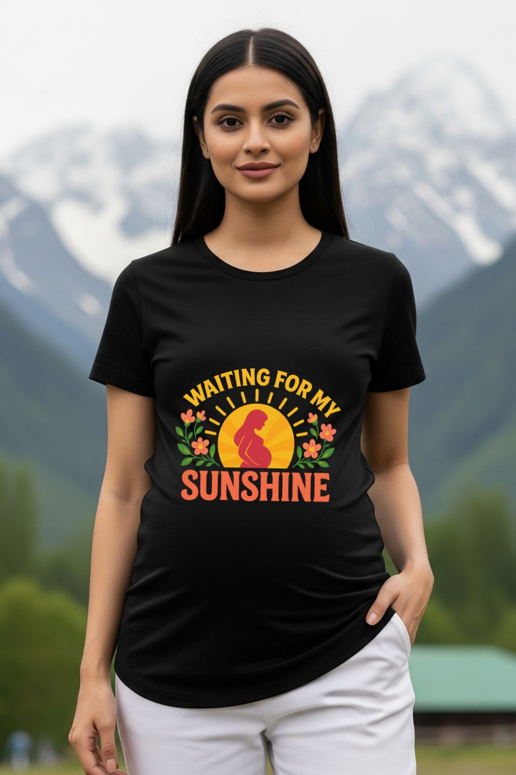 Woman wearing a black maternity dress with a pregnant mother icon with "waiting for you my sunshine" text