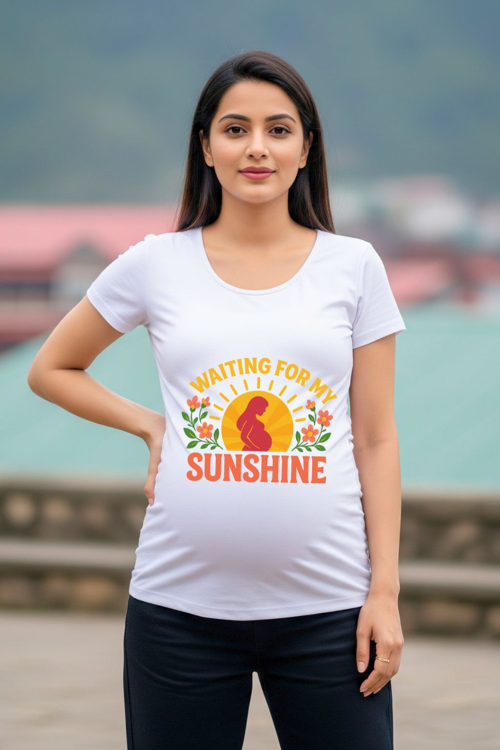 Woman wearing a white maternity dress with a pregnant mother icon with "waiting for you my sunshine" text