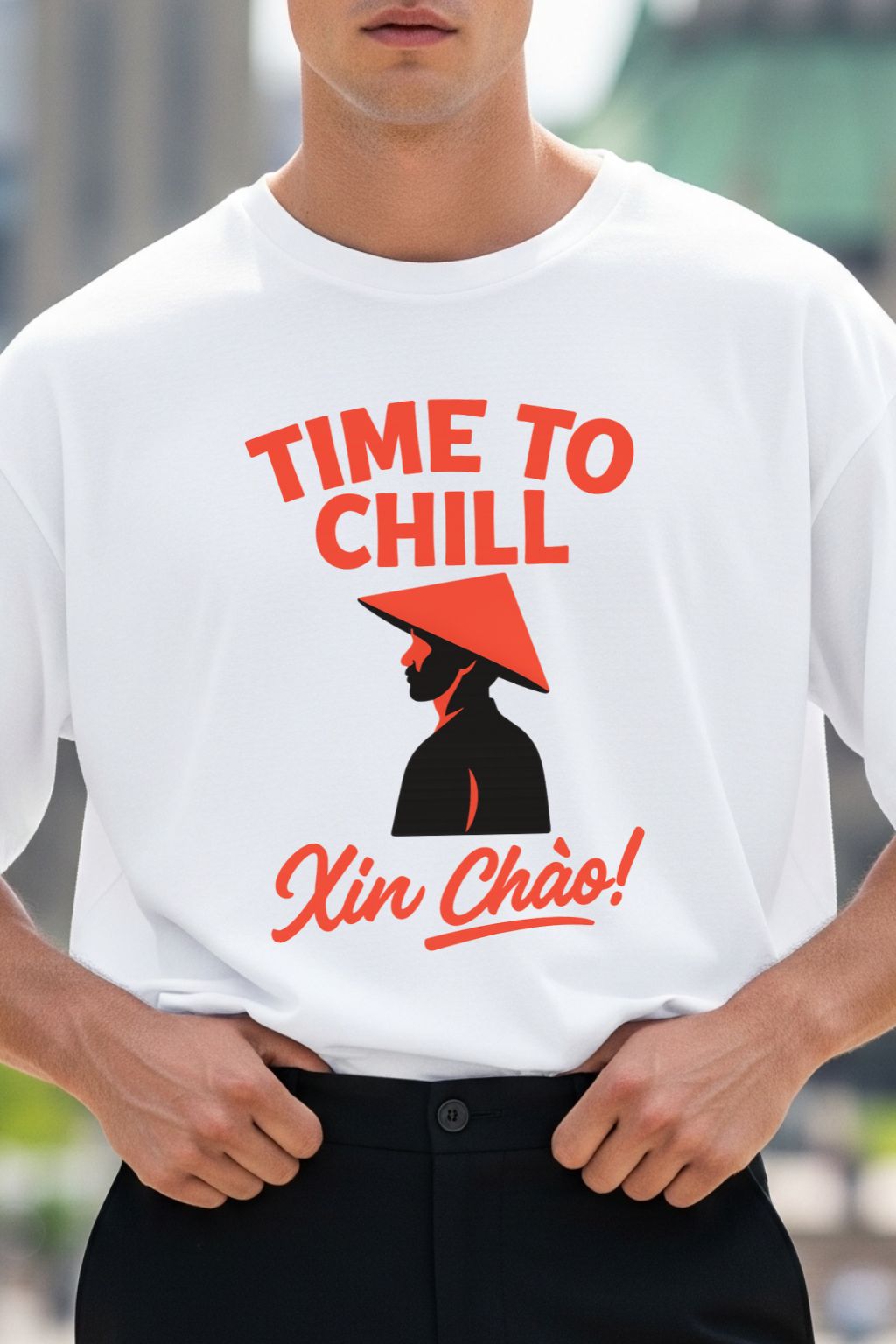 Man wearing a white t-shirt with 'Time to Chill Xin Chao!' design.