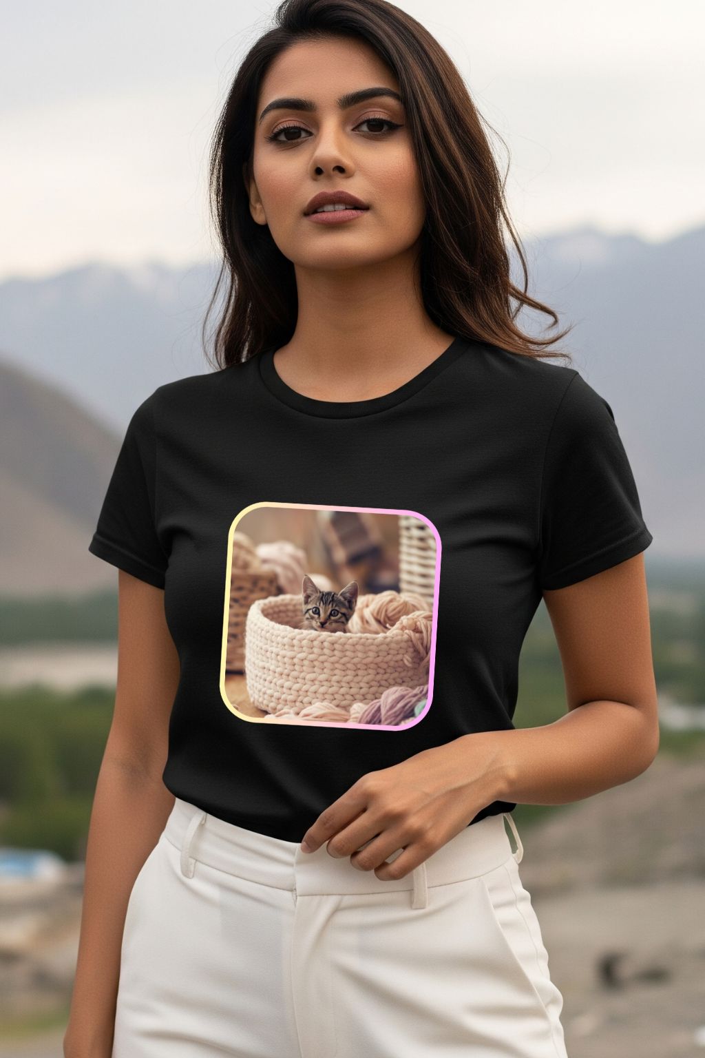 ZUPPI's "Your Daily Dose of Cuteness" black t-shirt, featuring a cat graphic in a basket, worn by a woman outdoors.